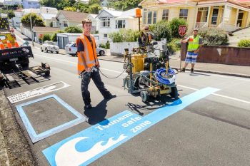 Painting of a Tsunami Blue Line in Wellington. Photo: Wellington Region Emergency Management Office (WREMO).