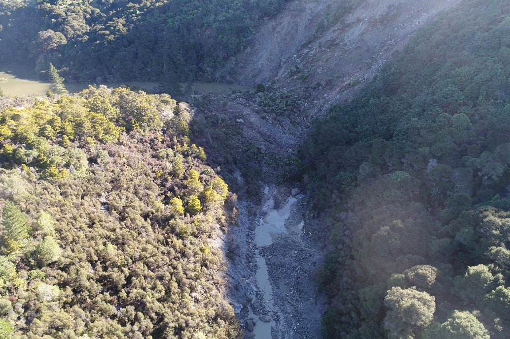 Landslide Dam showing lake building up behind it - Photo credit: Regine Morgenstern